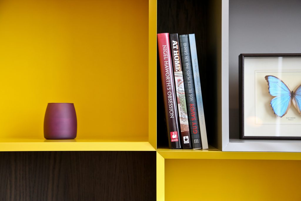 Colourful Revolution by Daniel Hopwood – yellow box shelving. Colourful interiors