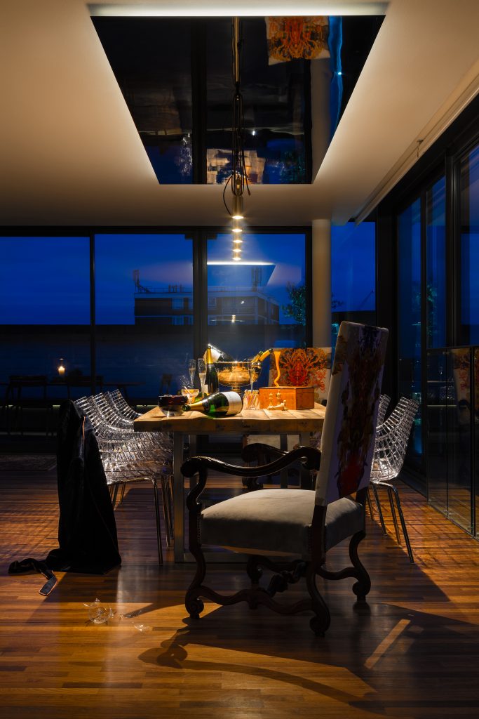 Night & Day by Daniel Hopwood – dining room with reclaimed wood dining table. Penthouse interior design, London