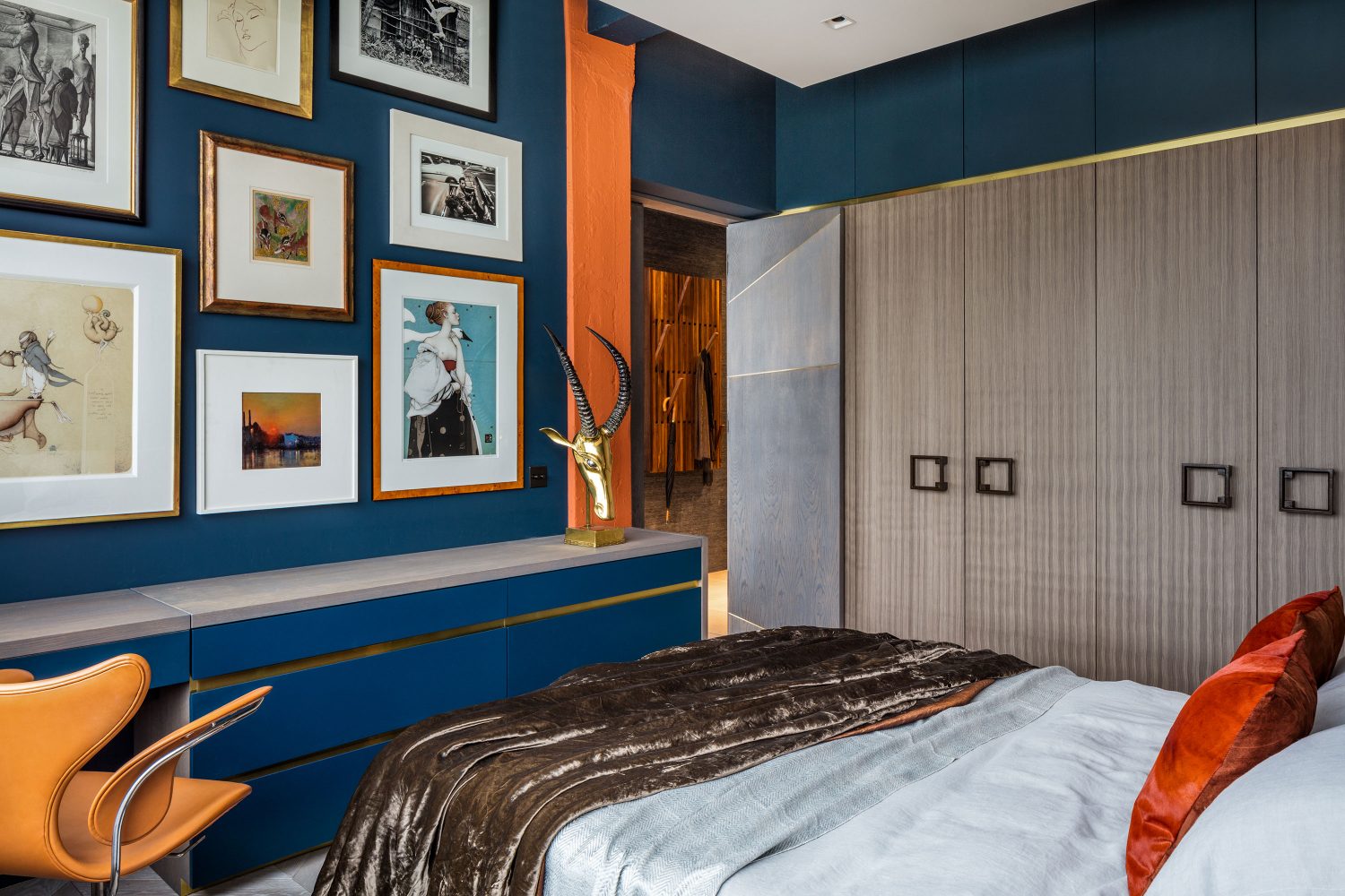 The Rovers Return by Daniel Hopwood – bedroom with blue and orange accents. Loft conversion designs