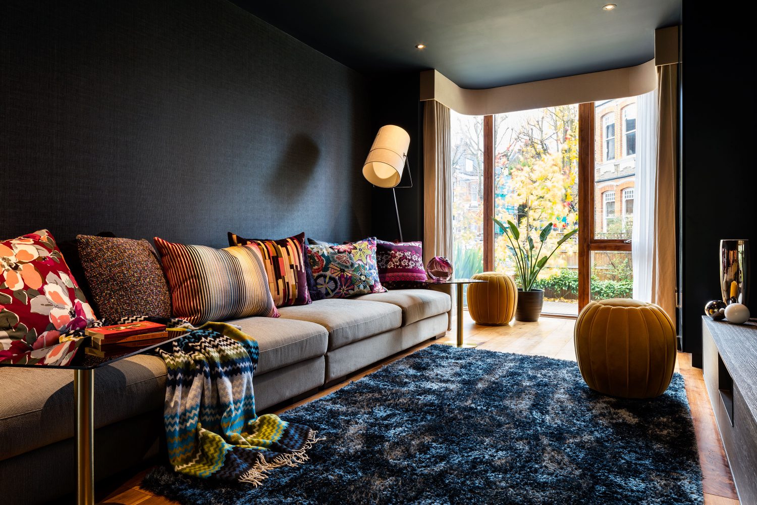 Mellow Yellow Islington interior design project, Daniel Hopwood. Dark living space with pops of colour